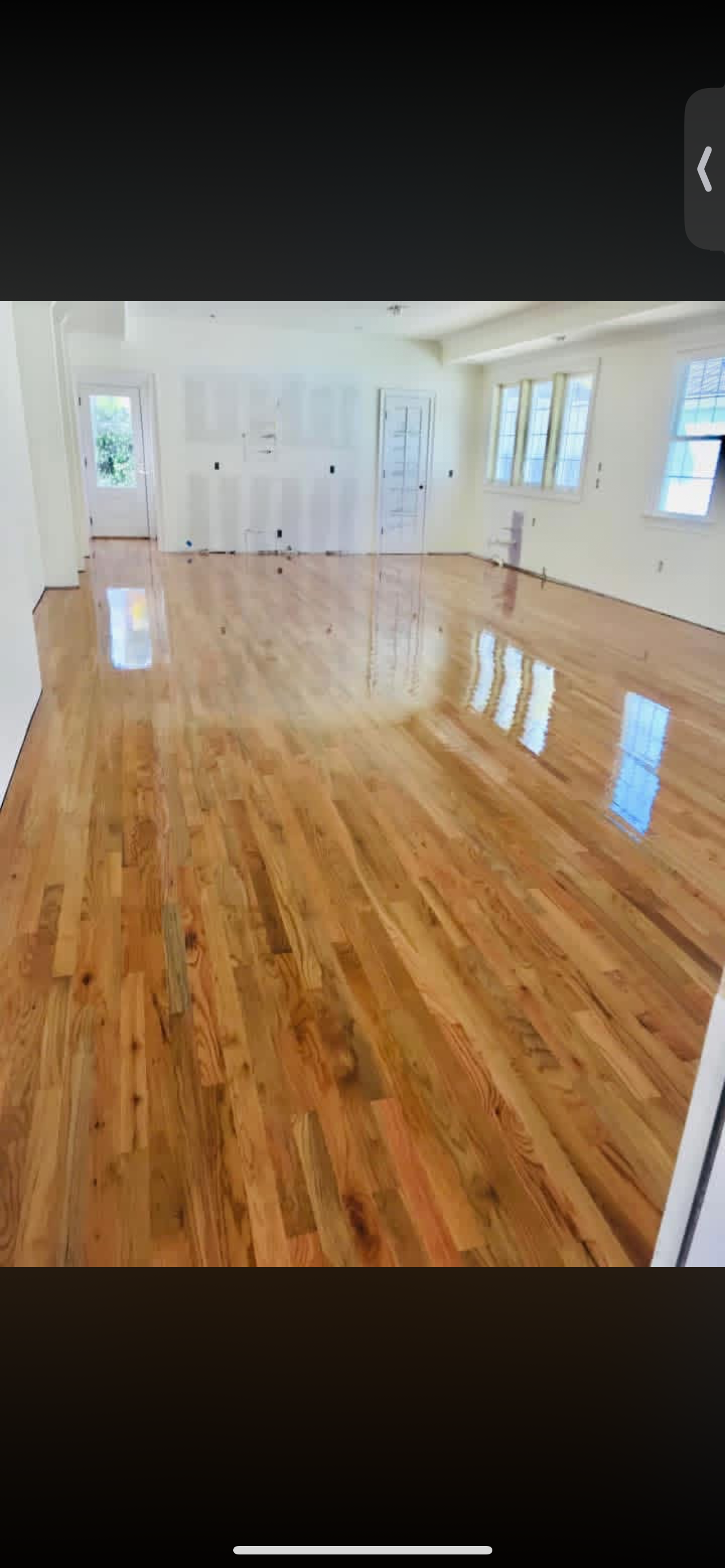 Freshly refinished hardwood flooring, open room